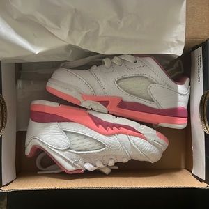 Pink and white Jordan’s 6c